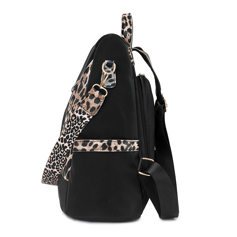Spot wholesale 2025 nueva mochila antirrobo para mujer moda color de contraste mochila de nailon de viaje ligero bolso de doble uso
