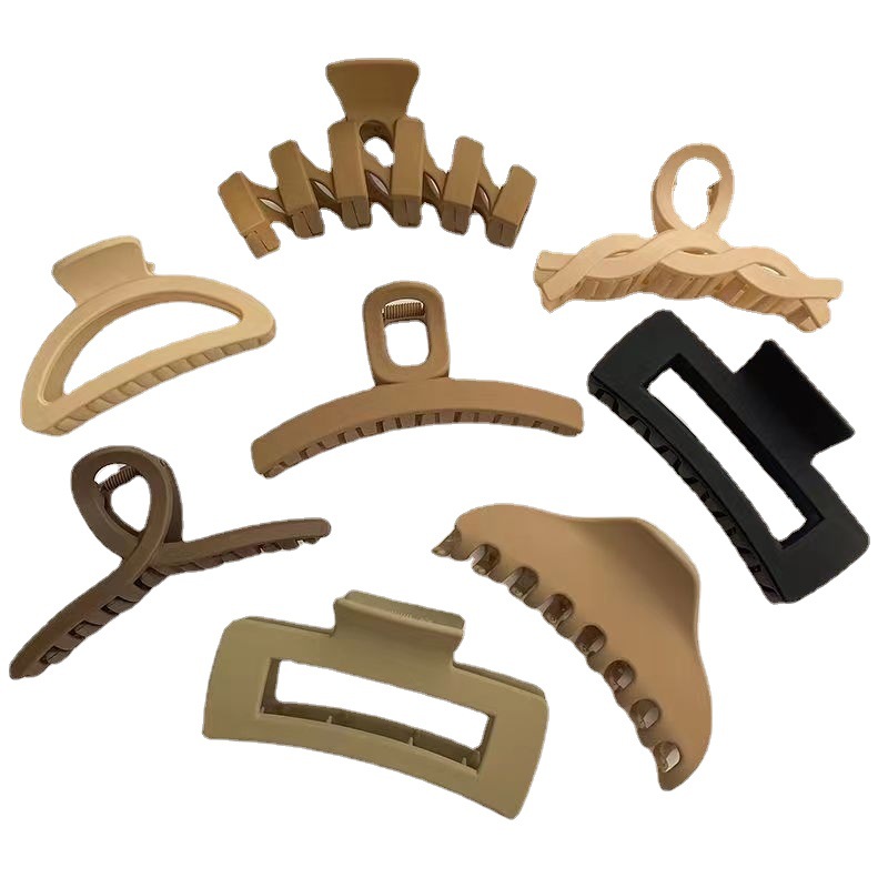 La nueva leche marrón gran tiburón clip moda temperamento de alto sentido pelo acrílico más agarrar la parte posterior la cabeza