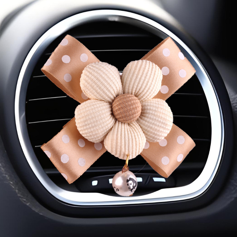 Nueva decoración de coche de aromaterapia de camelia creativa, decoración de salida de aire acondicionado de la consola central del coche de fragancia pequeña