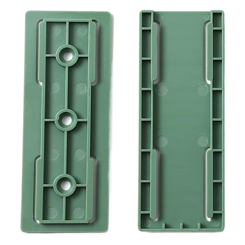 Soporte de enchufe de fila autoadhesivo sin costuras montado en la pared almacenamiento sin perforación sin placa de parche vinculante hebilla de enrutador al por mayor