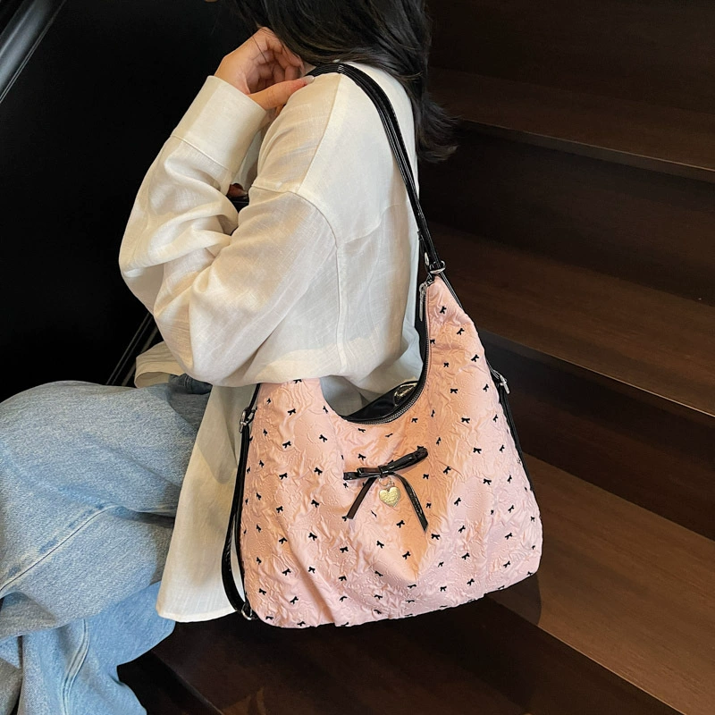 Capacious shoulder bag with bow, backpack