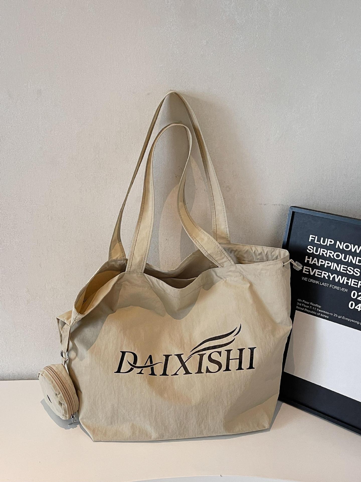 Bolso de estilo perezoso para mujer de gran capacidad 2025 nuevo bolso de lona coreano bolso de mujer de viaje ligero de ocio