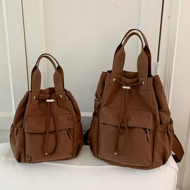 Lulu's New Drawstring Bucket Bag Is Simple and Stylish, Waterproof Backpack, Versatile Tote, Handbag, Shoulder Bag, Crossbody Bag for Women Lulu's New Drawstring Bucket Bag Is Simple and Stylish, Waterproof Backpack, Versatile Tote, Handbag, Shoulder Bag, Crossbody Bag for Women