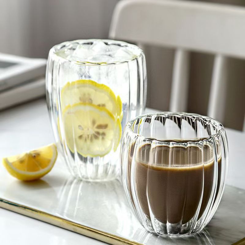 Taza de vidrio de alta borosilicona transparente con mango creativo de alta temperatura resistente a la taza de café