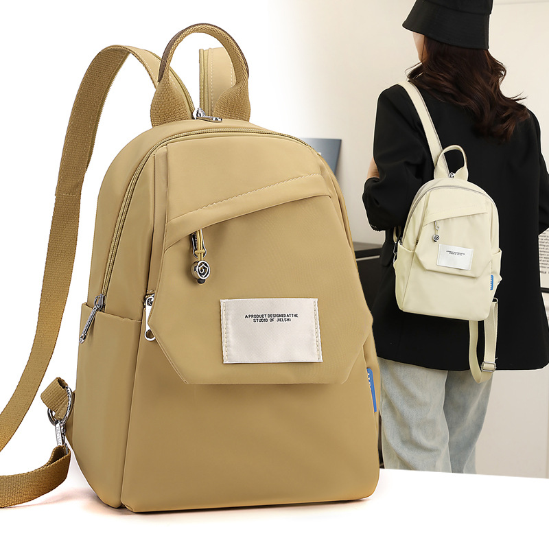 轻便防泼水尼龙包多功能女士双肩包休闲出行胸包大容量手提包便携