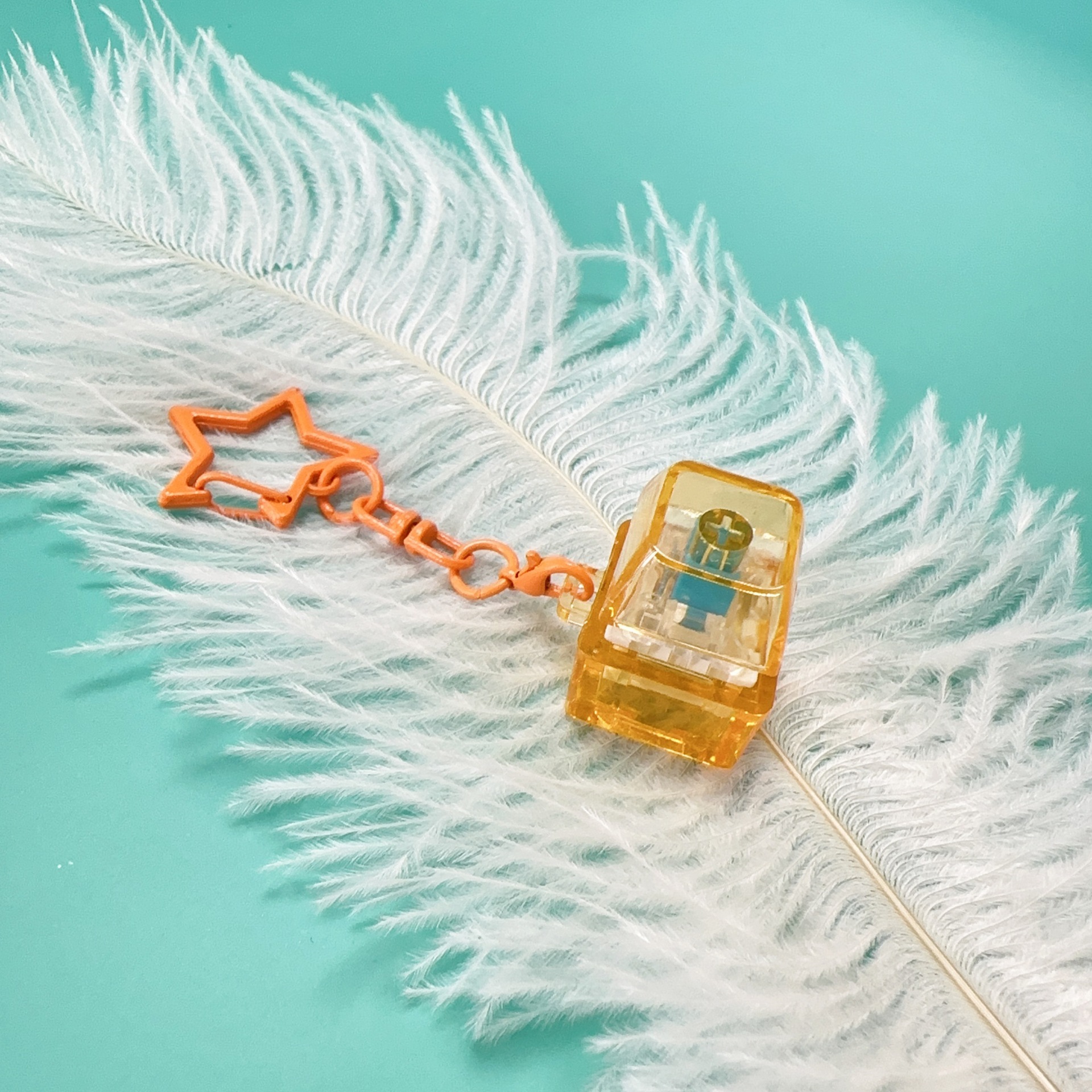 Pc single button-orange transparent-star chain