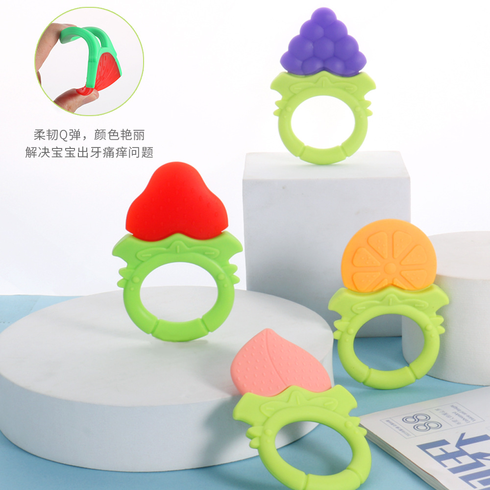 Bebé fruta mordedor bebé mordedor palo de silicona fruta tire anillo fruta y verdura música fruta juguete fábrica al por mayor