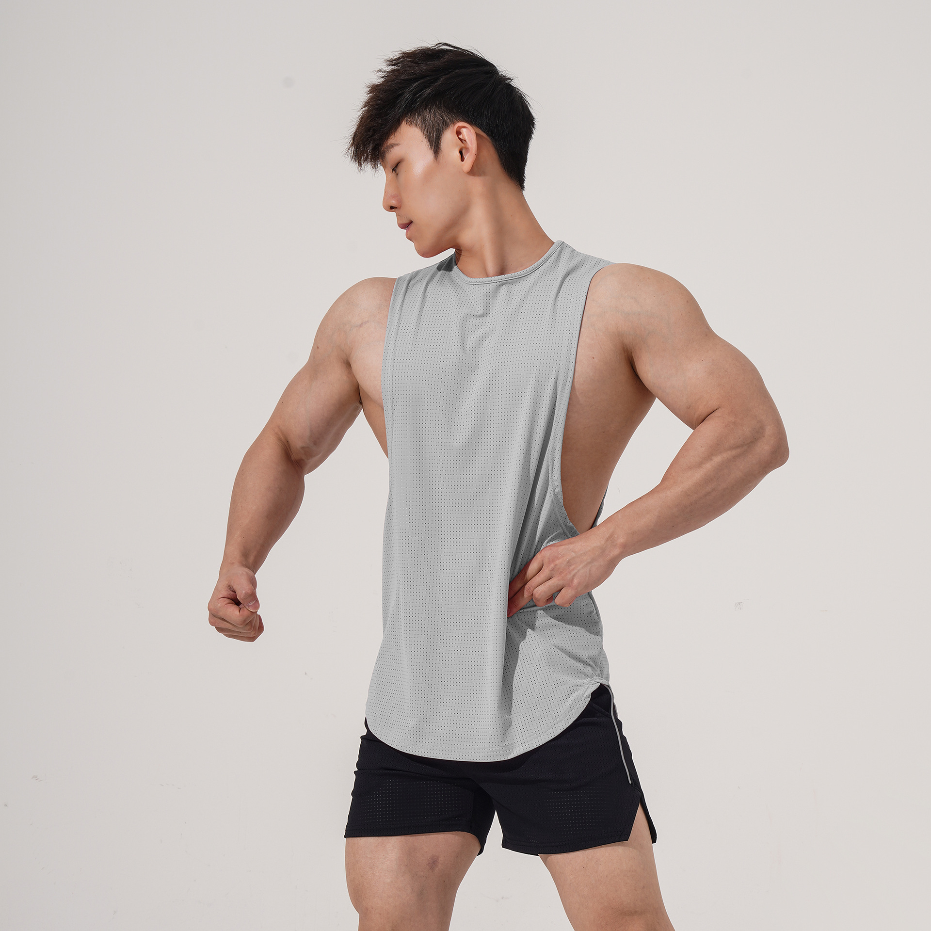 Chaleco transfronterizo de Europa y América malla de material de nylon de los hombres deportes gimnasio chaleco cuello redondo sin mangas en stock suministro
