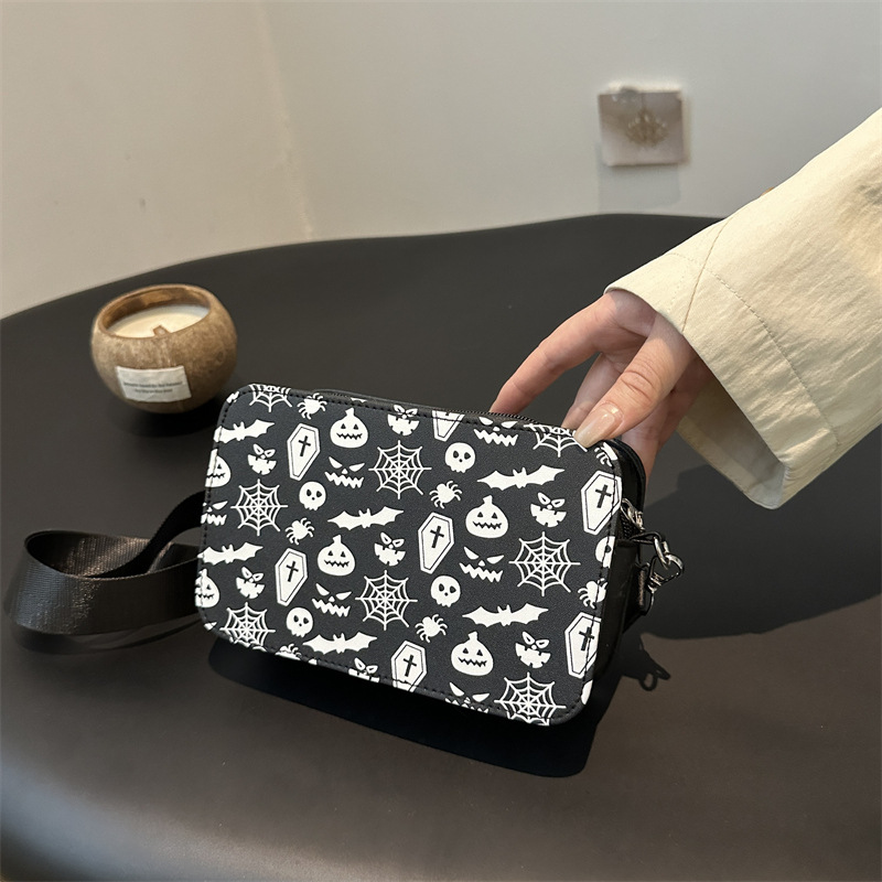 Bolso de mujer transfronterizo 2025 nuevo bolso de mujer impresión calavera cámara bolso pequeño bolso de hombro de aire extranjero bolso de mochila de teléfono móvil