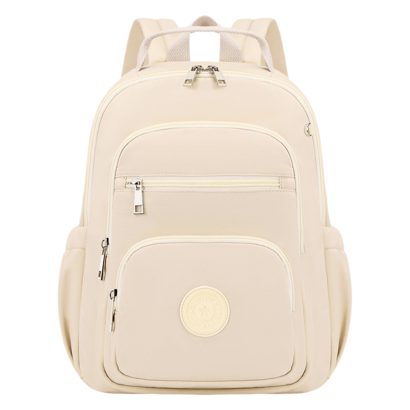 Mochila impermeable de gran capacidad para mujer, nueva colección 2025, venta al por mayor del fabricante, mochila de doble hombro de color sólido, bolso de gran capacidad con múltiples bolsillos