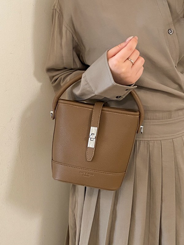 Litchi estampado bolso de cubo de mano mujer 2026 venta caliente nueva moda coreana alta textura mochila de hombro