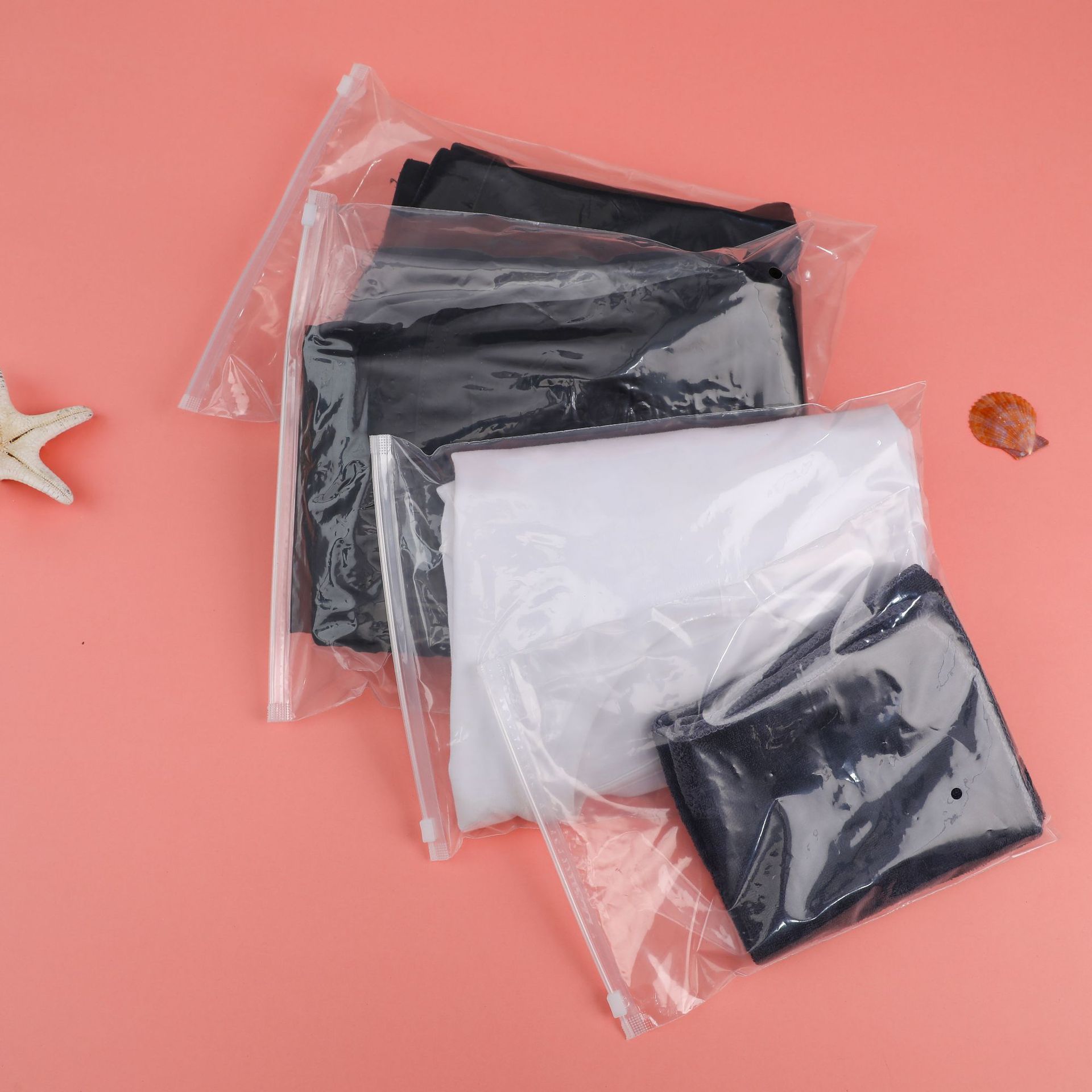 Bolsa de almacenamiento de ropa con cremallera transparente de PE, bolsa de embalaje de ropa con cierre hermético esmerilado, bolsa de embalaje de ropa para calcetines y ropa interior al por mayor.