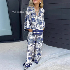 2025種類の欧米の越境ファッションの新型のストライプのスーツの婦人服の長袖のゆったりしている版のシャツの上着のポケットの広い足