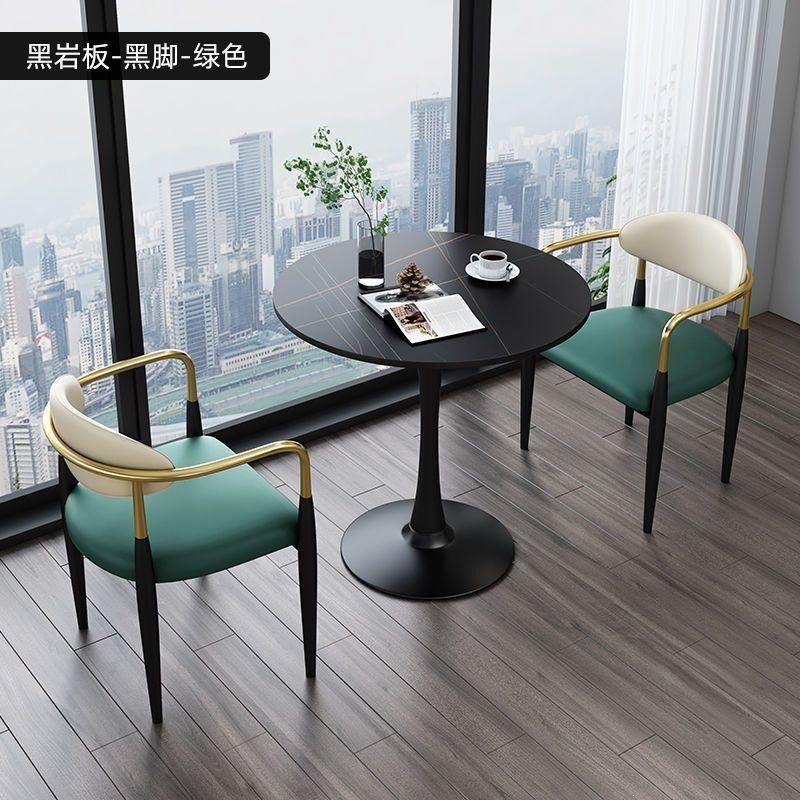 Black legs + black rock slab + green leather, one table and two chairs