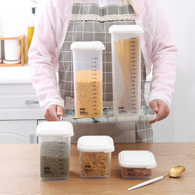 La cocina importada de Corea de Corea a prueba de humedad, caja de almacenamiento de alimentos de plástico, granos, frutas secas, galletas, tanques de almacenamiento.