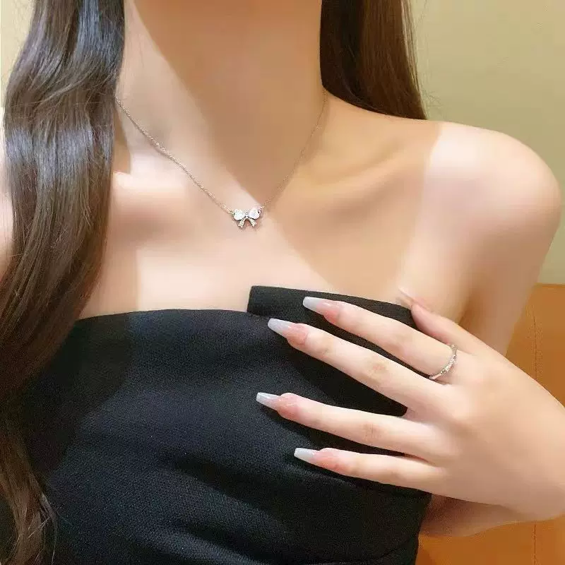 花丛饰品猫眼石蝴蝶结项链女小众甜美气质锁骨链送朋友礼物
