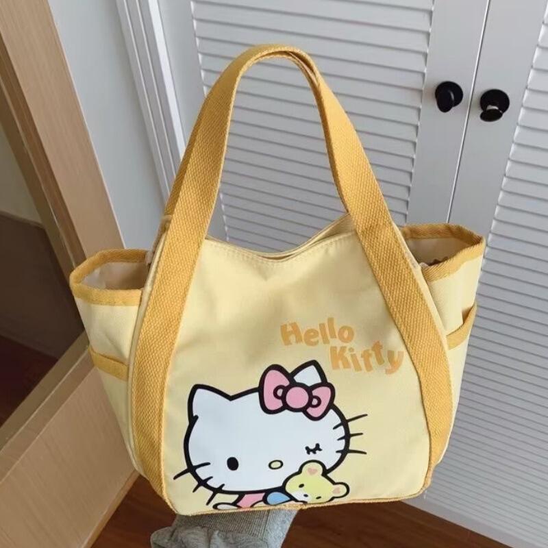 Popular handbag with KT cat print, cute cartoon tote bag, large-capacity commuter handbag for office workers, wholesale