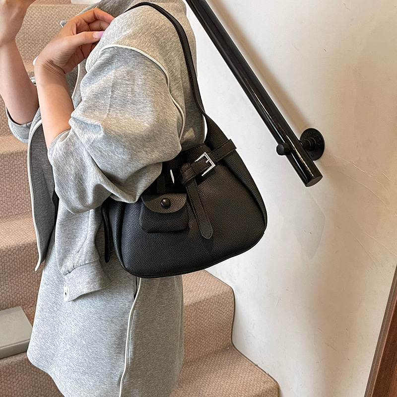 Bolso de cubo de aire extranjero de tendencia transfronteriza para mujer 2025 nuevo bolso de mensajero de viaje casual bolso de hombro de axila de moda de todo fósforo