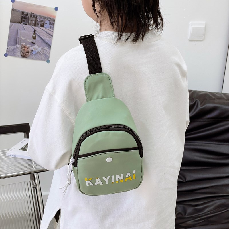 2025 nuevo comercio exterior bolso de pecho para niños letras coreanas de moda cool baby mochila pequeña bolsa de cambio de viaje ligera