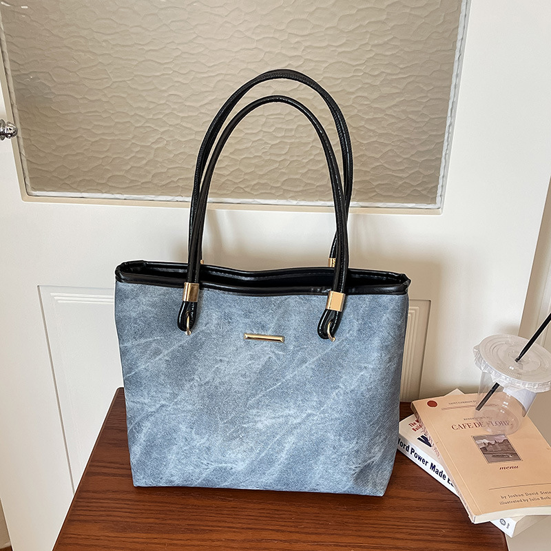 2026 nuevo retro de gran capacidad bolso de mano de hombro para mujeres de alta calidad sensación de viaje bolso de moda versátil bolso simple