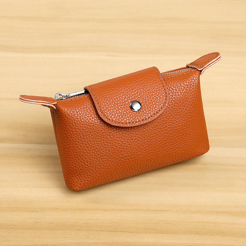 Nuevo bolso de cambio de cuero de moda para mujeres, bolso de llaves con cremallera, bolso de monedas portátil, retro y pequeño.