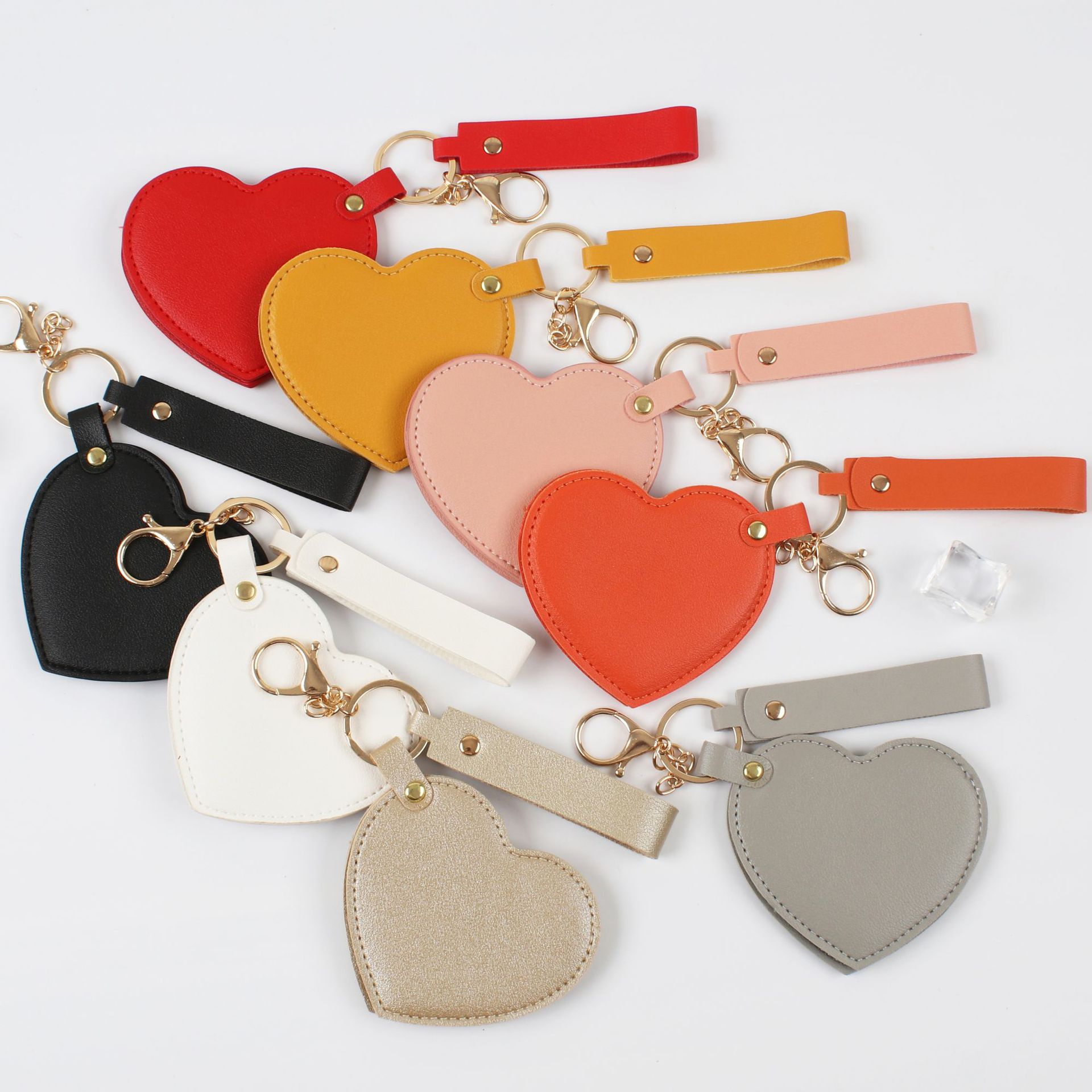 Polyurethane rotating fashionable mirror, handheld folding keychain, internet celebrity