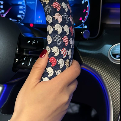 Steering wheel cover — in the Car
