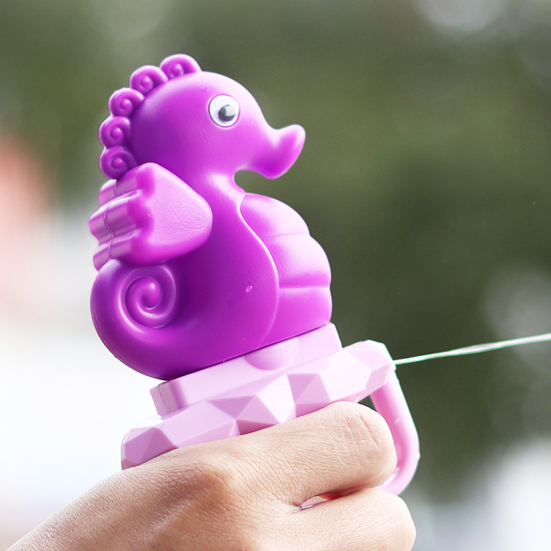 Niños de dibujos animados transfronterizos dinosaurio pistola de agua lucha de agua juguetes de agua de verano niños Prensa de dibujos animados pequeña pistola de agua al por mayor