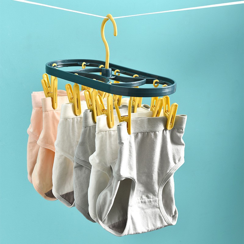 Al por mayor nuevo multi-funcional plegable percha de ropa 12-clip plástico percha ropa tendedero dormitorio calcetines secado artefacto