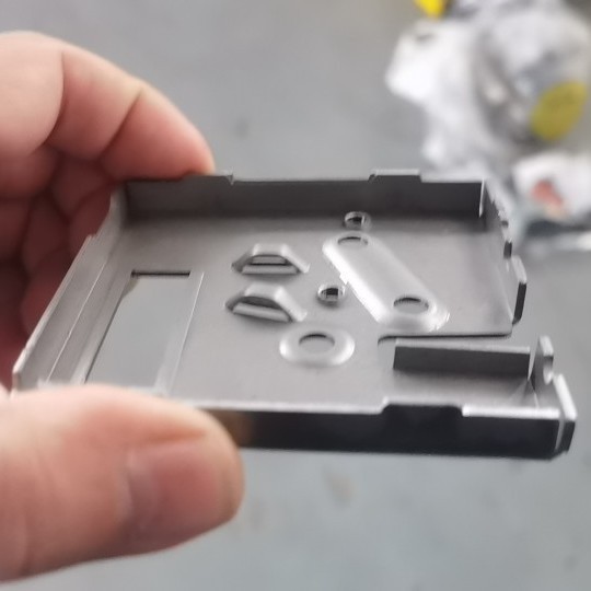 电磁锁壳汽车锁金属加工件连续成型模具单工程来图制造冲压钢模