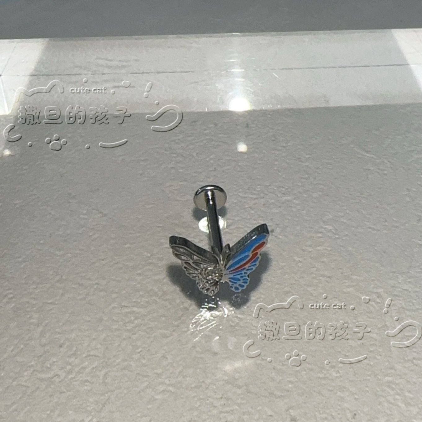 Silver pointed spike labret stud material detail