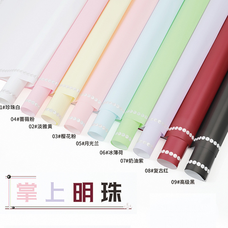 Huaxi fábrica de perlas de palma al por mayor de papel elegante puntos alrededor del borde impermeable perla envoltura material de embalaje de flores de papel