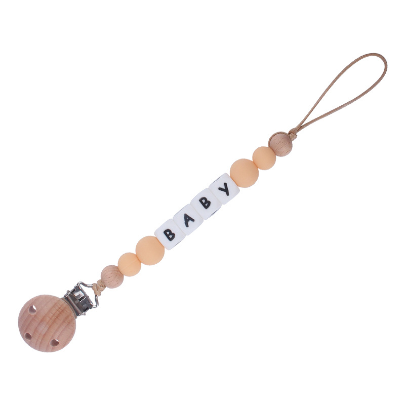 Nuevos suministros para bebés Haya agujero redondo clip bebé creativo DIY chupete Cadena de silicona mordedura de juguete cadena anti-caída