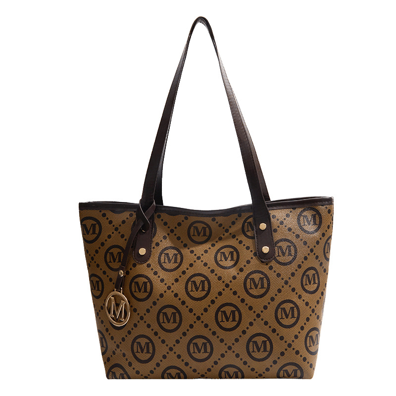2026 nuevo retro de gran capacidad bolso de mujer de moda viaje bolsa de hombro bolso de mano letras impresa bolsa comodo