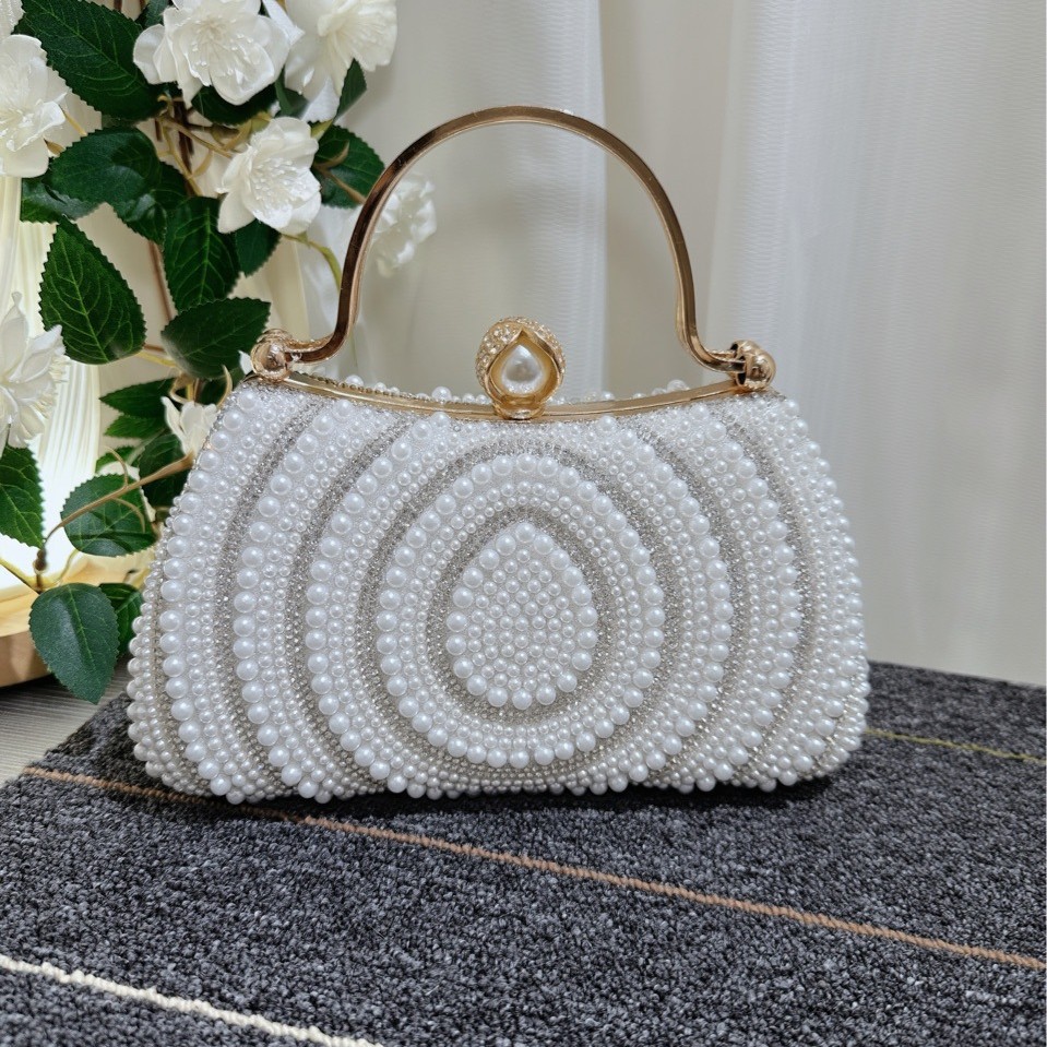 Borsa a mano con pochette tempestata di diamanti e perle da donna in stile europeo e americano, molto venduta oltre confine_voghion.com