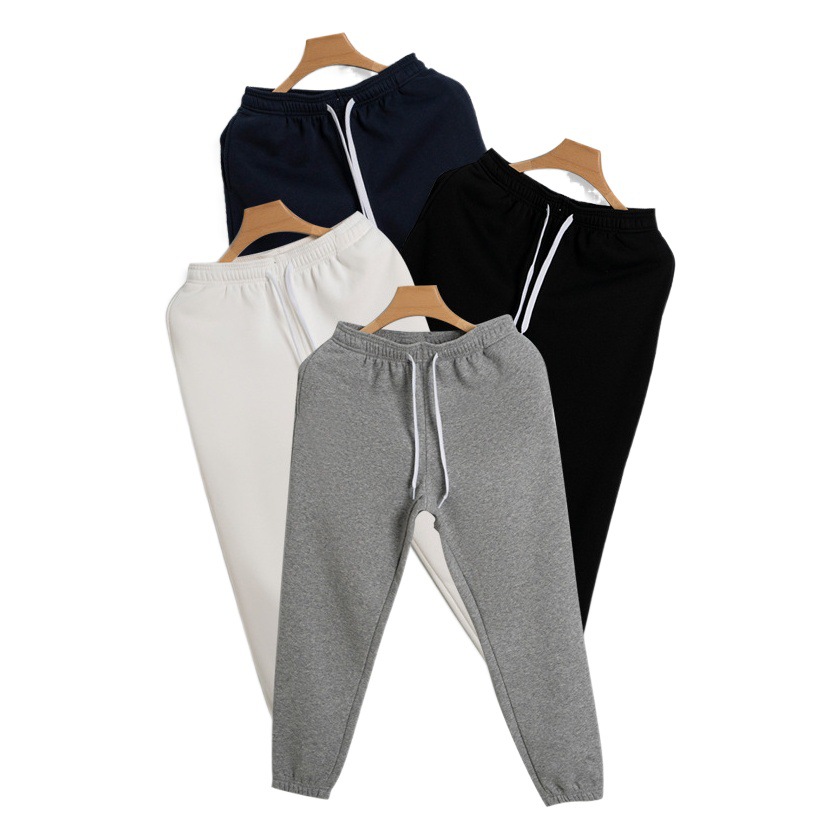 De gama alta de 430g de lana forrada engrosada Pantalones deportivos de otoño e invierno de los hombres Nuevos pantalones sueltos de algodón atado al tobillo pantalones casuales de chándal de las mujeres