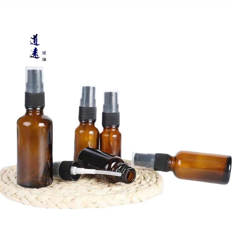 En stock Botella de aceite esencial marrón botella de spray de plástico botella de vidrio marrón a prueba de luz 20ml sub-botella cosmética tipo prensa