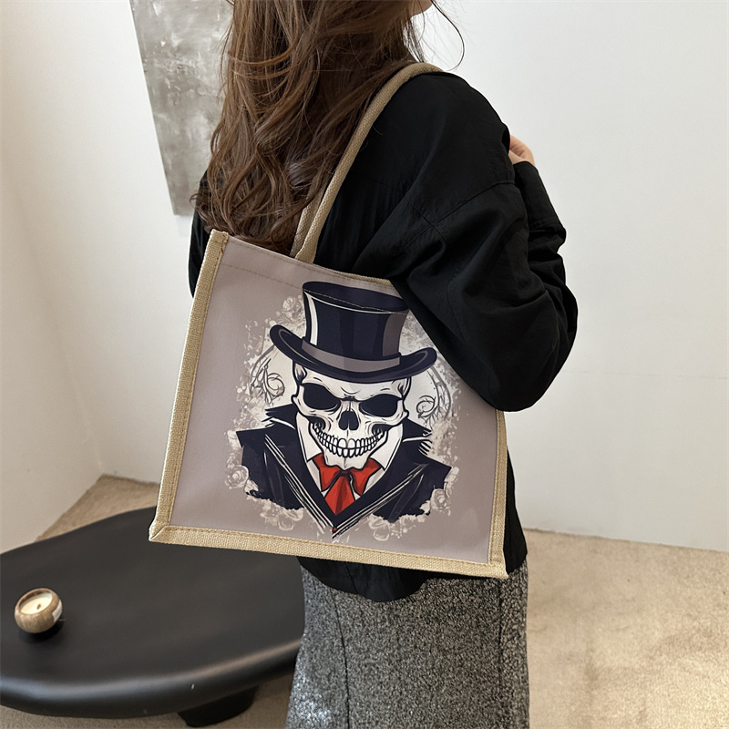 Nueva bolsa de lona de calaveras, bolsa de mano de gran capacidad para mujeres, bolsa de hombro para clases, moda 2024