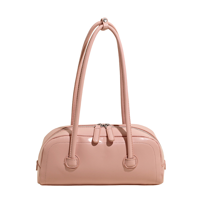 High-end nicho de moda bolso de hombro de mano para mujeres 2025 verano nuevo estilo simple bolso de viaje de palo bolso debajo de la axila