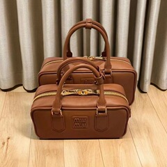 Iuミュウ家の新型の小さい方のカバンのボーリングの手提げ袋のファッションの百合の肩の斜めなショルダーバッグのボストンの女性のカバン