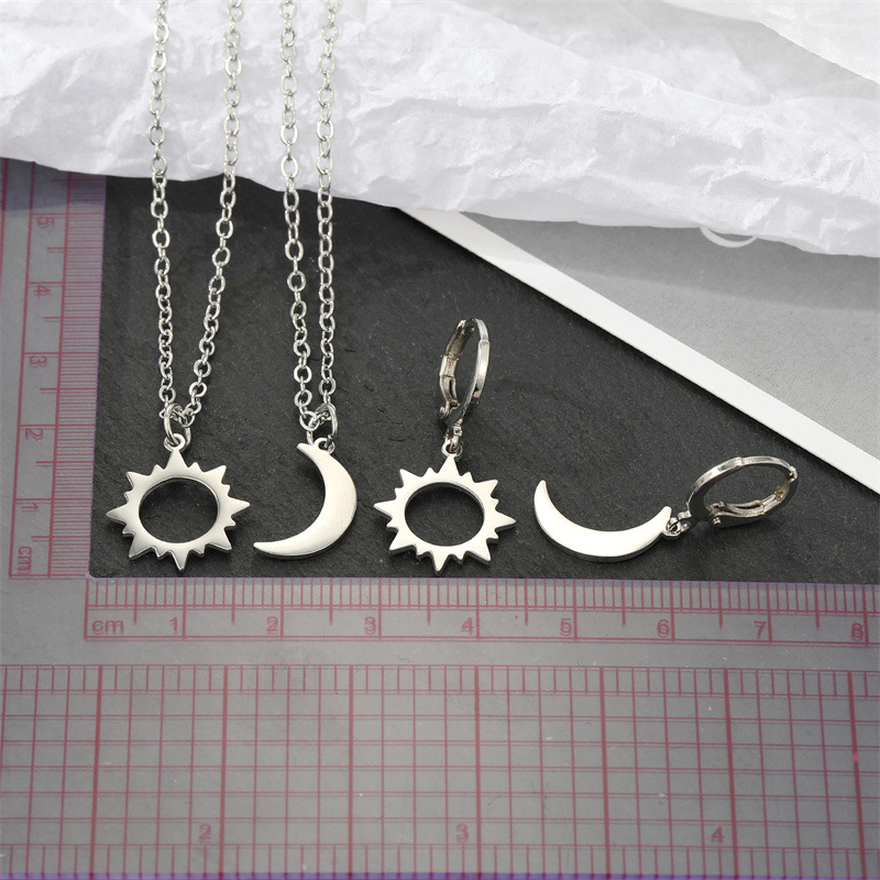 Korea Simple Alloy Hollow Sun Moon Asymmetric Earrings Necklace Wholesale display picture 2