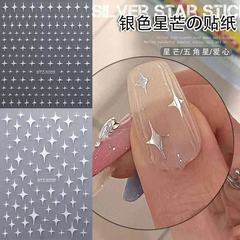 ネイルアートステッカー、フラッシュライト高級スターバーストスターステッカー、ハイエンドゴールドとシルバーの黒と白のスターネイル粘着ステッカー装飾