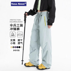 NASAの夏の百合の女性の突撃ズボンの薄いタイプの屋外の防風の防水の登山の速乾の傘の兵の工装の長い半ズボン