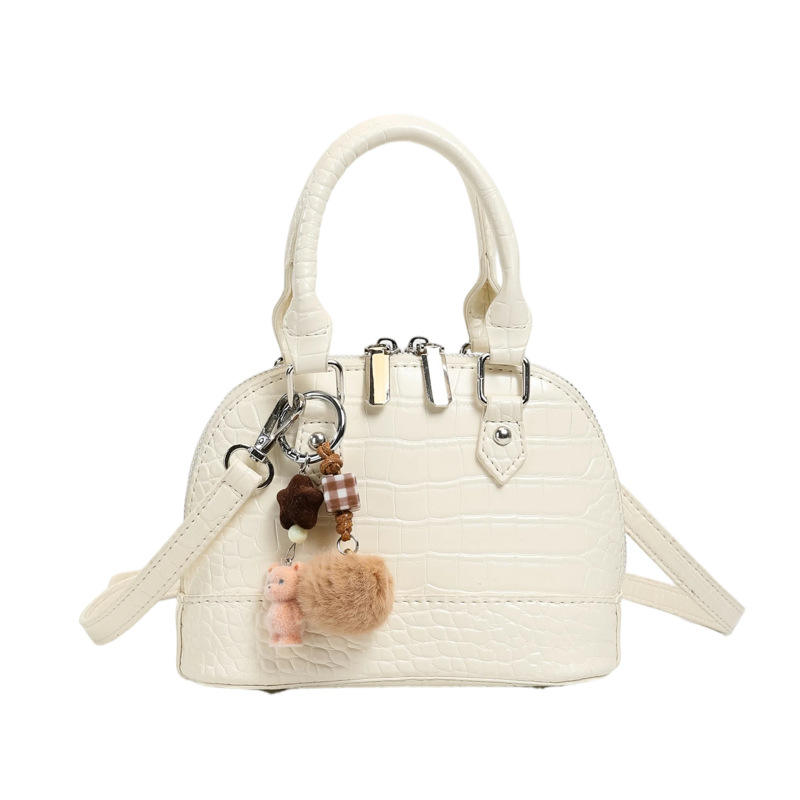 Verano estampado de piedra sensación diaria bolso de mano para mujeres 2026 nueva moda viaje bolsa de hombro bolsa de concha de tramo inclinado