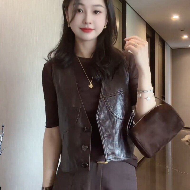 Short V-neck buttoned leather vest for women, 2026 autumn new style, high-end, loose-fitting, slimming, versatile, trendy outerwear Short V-neck buttoned leather vest for women, 2026 autumn new style, high-end, loose-fitting, slimming, versatile, trendy outerwear