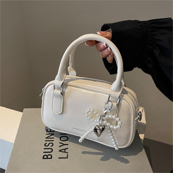 Bolso de mano de alta textura versátil verano 2024 nuevo bolso de mujer estilo extranjero versátil bolso de hombro bolso de viaje