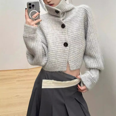 韓国版の高襟のゆったりした短いニットのカーディガンの女性の春秋の新型の気質の復古のセーターの上着のコート