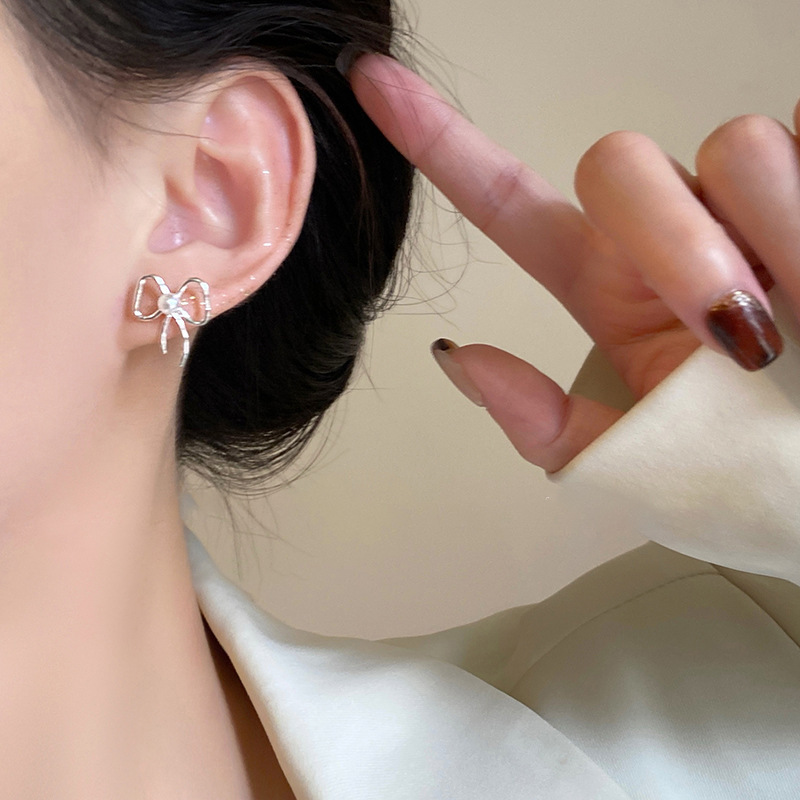 Aguja de plata, perla, circón, borla, pendientes de moda, lujo ligero, pendientes de alta gama, pendientes de todo fósforo exquisitos de nicho, mujeres al por mayor