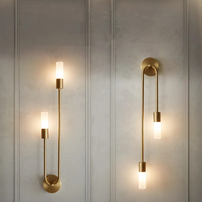 Modern and minimalistic golden creative sconce for living room