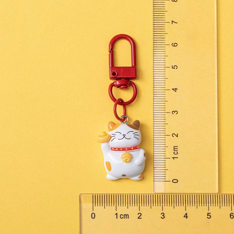 Cute mini gato pequeño colgante llavero yuanbao bolsas de Año Nuevo chino artesanías de resina regalos de decoración
